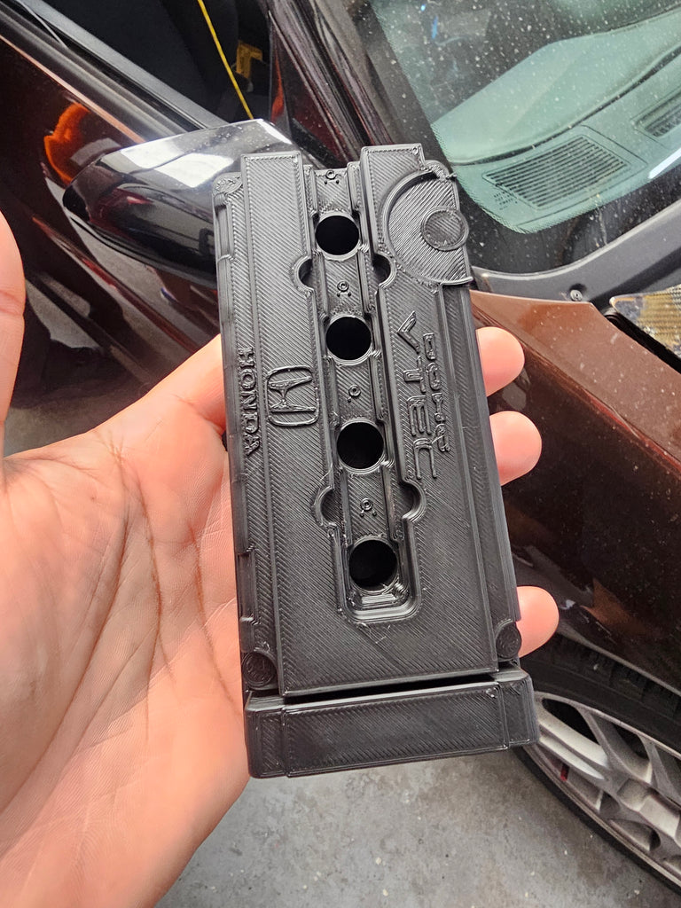 B series spark plug holder