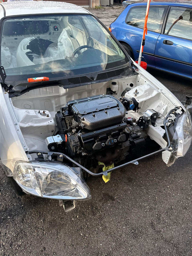 Civic radiator tube support